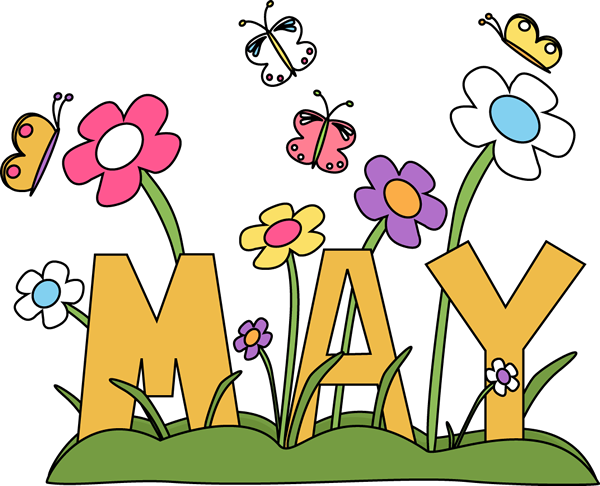 The word May sitting on grass with flowers sprouting.